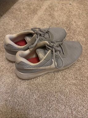 Nike Women’s Light Gray Mesh Athletic Sneakers with White Swoosh